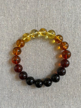 Natural Rainbow Baltic Amber Round Beads Stretch Bracelet.